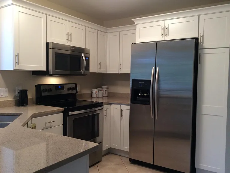 Updated Kitchen with Stainless Appliances and quartz counter