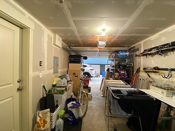 Garage + BONUS outdoor designated parking spot!