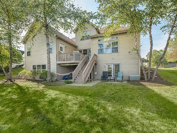 You can see the full walkout basement and 2nd level deck.