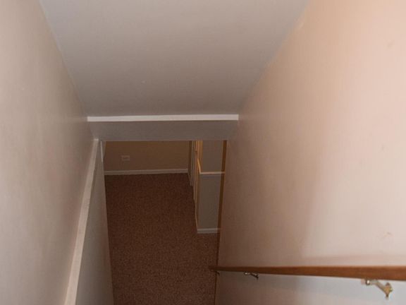 Stairs to Finished Basement off the Kitchen/Dining Area