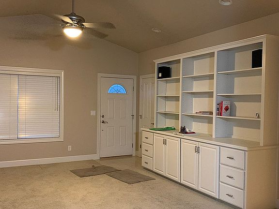 Living room has tile entry  