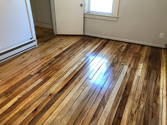 Large bedroom with refinished floors!