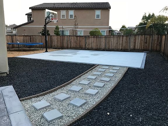 Basketball court with play area