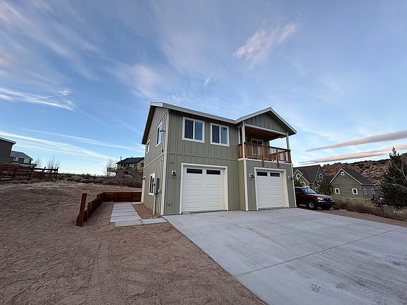 Exterior driveway parking space available for two cars. No parking allowed in the garage.
