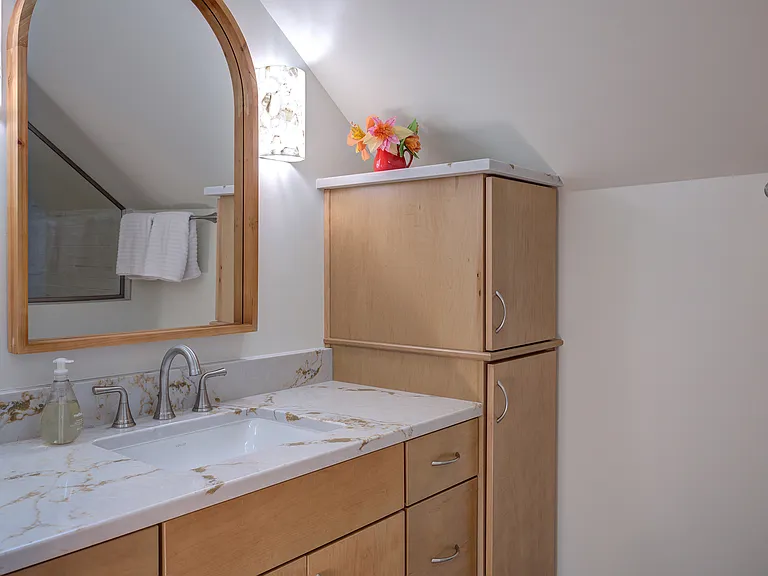 Upstairs bath vanity.