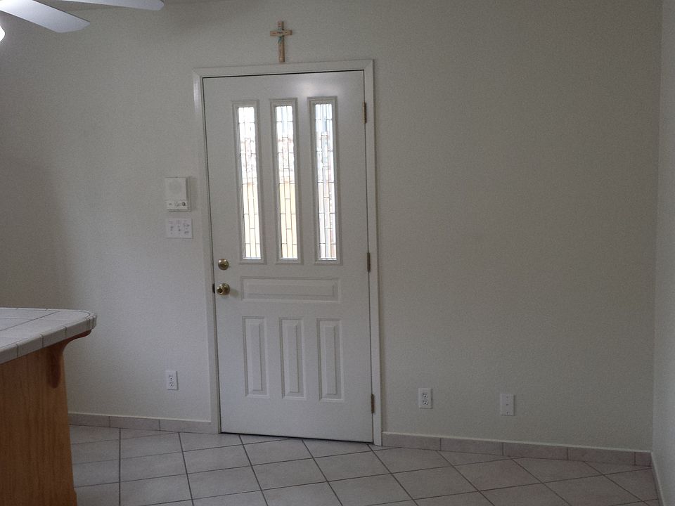 From the end of the kitchen showing the dining area.