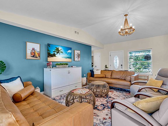 The living room provides plenty of space for the entire family.
