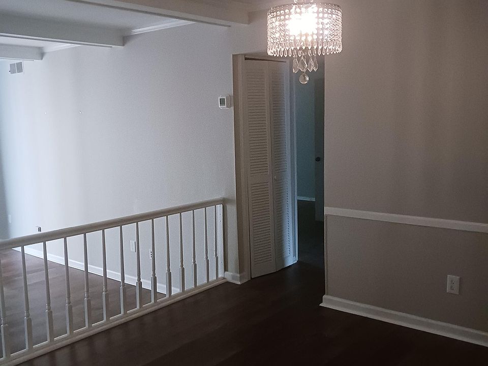 Dining room with hallway to master bedroom.