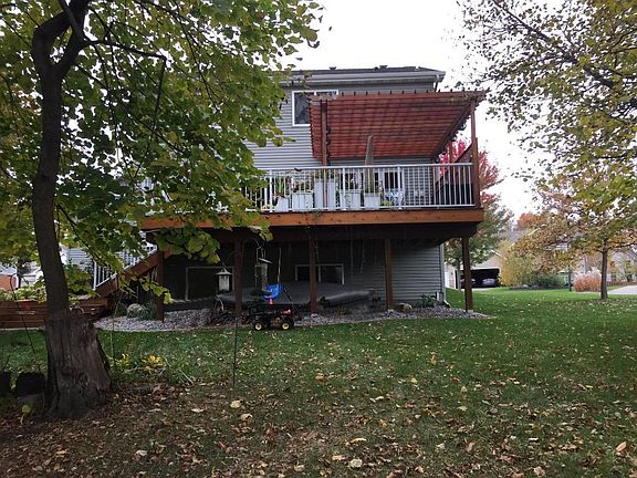Main level living room has gas burning fireplace