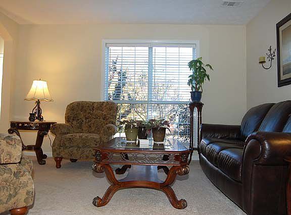 Living Room Overlooks Front Lawn and Cul-De-Sac