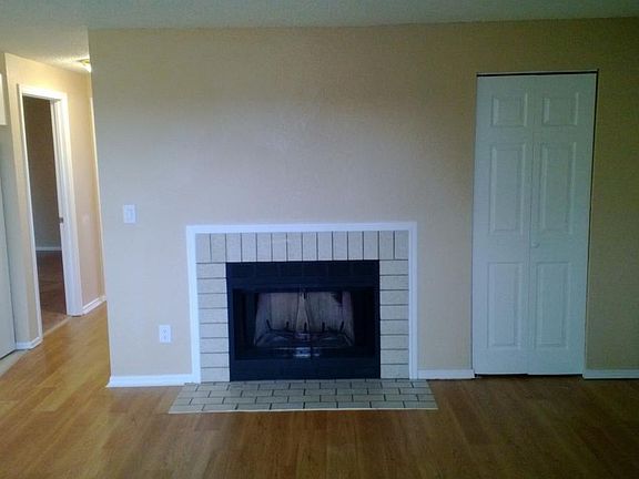 real fireplace, new plank flooring