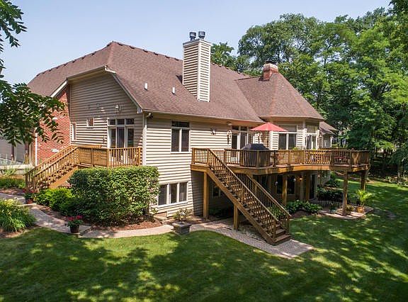 There are multiple decks, balconies and a brick paver patio available for relaxing outdoors, or ente