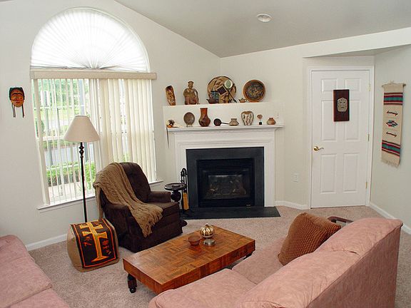 Living room with gas fireplace, Paladian window, carpet replaced 2014