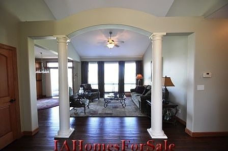 Great Room- With a beutiful view of pond and 4 th hole