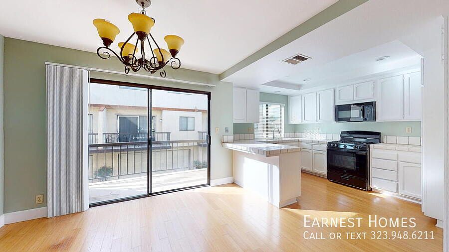 1st image of 22525 Sherman Way Unit 1403