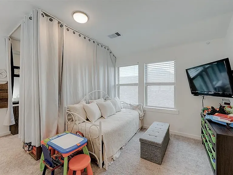 The game room upstairs. Note that the divider is no longer there, so it's an open concept now