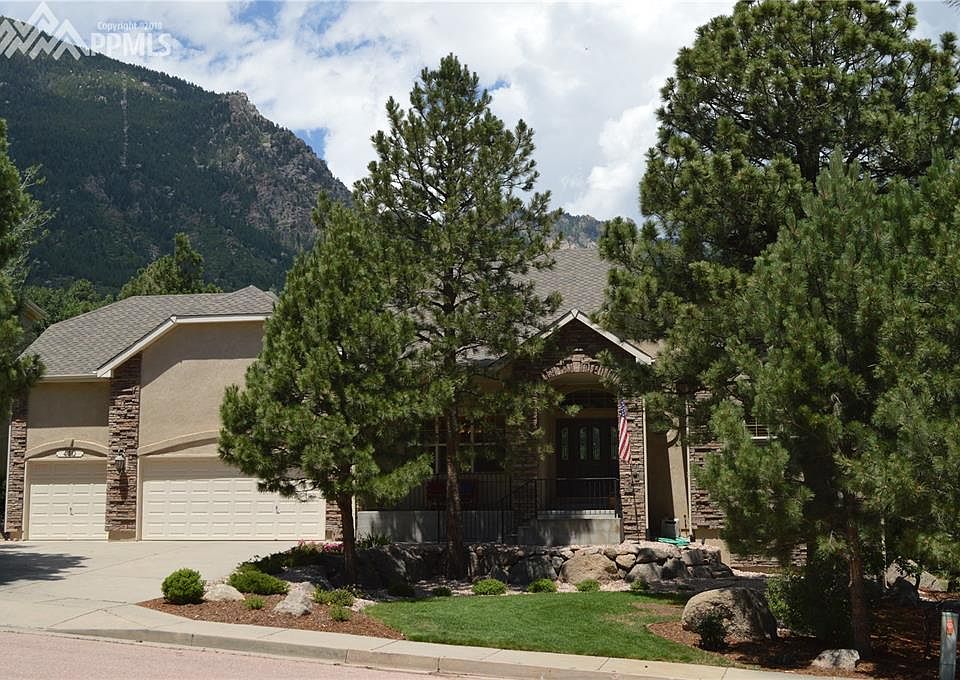 Front of house shares the privacy and shade of the majestic pine trees - custom 