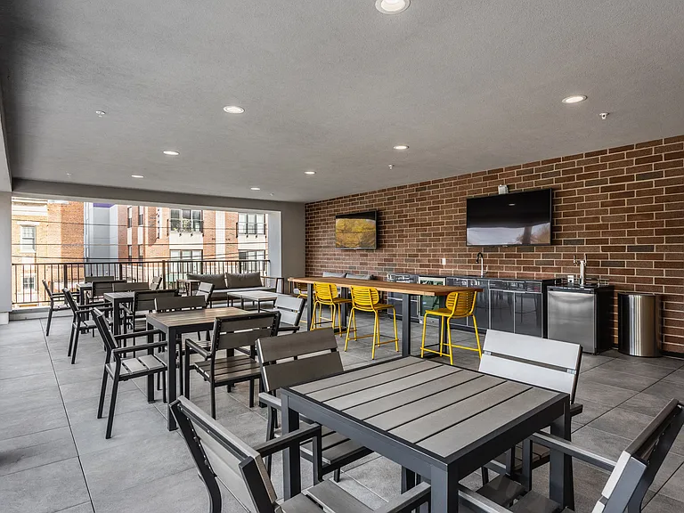 Private Sky Lounge Complete with Outdoor TVs and Kitchen Area