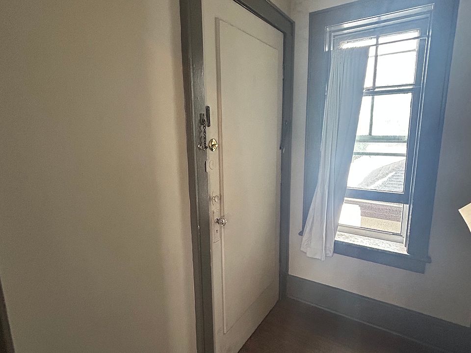 Entry way/front door (with built-in storage rack for shoes or belongings).