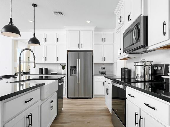 Open kitchen with decorative lighting