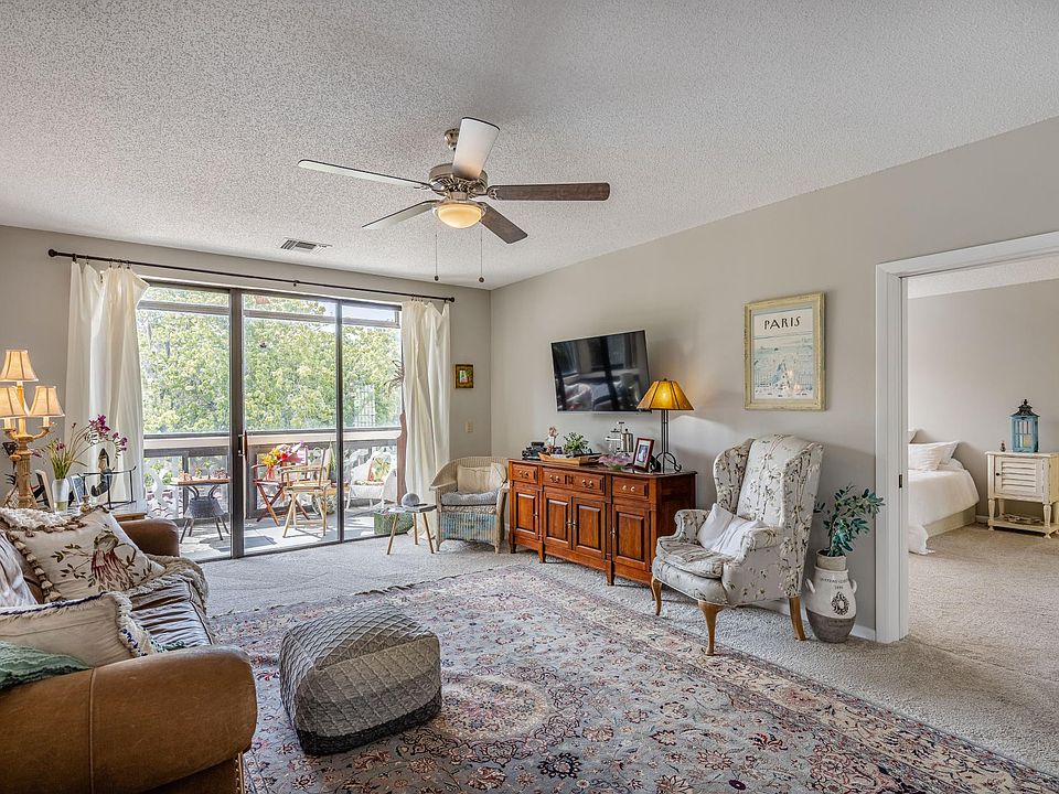 Living room with master bedroom entry