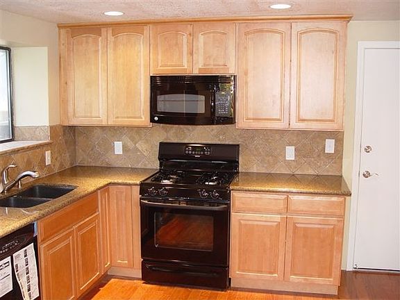 Solid wood cabinets (no particle board).
