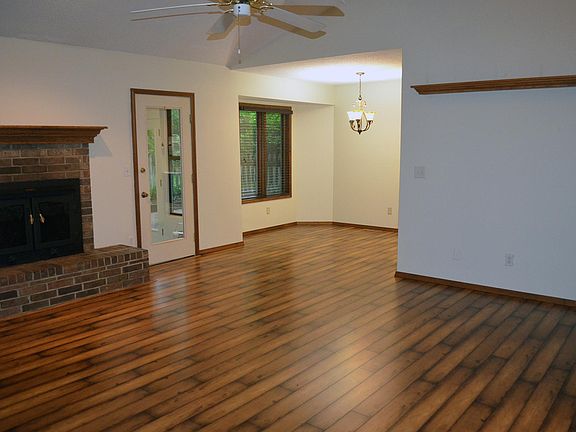 Greatroom looking in to Dining area, door leading to All-seasons Sunroom and Courtyard Patio