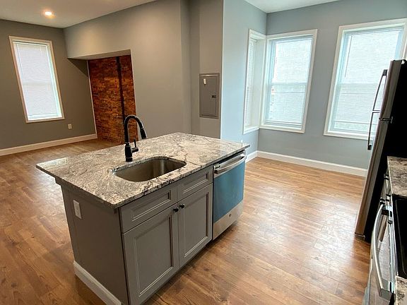 All stainless steel appliances , including dishwasher.