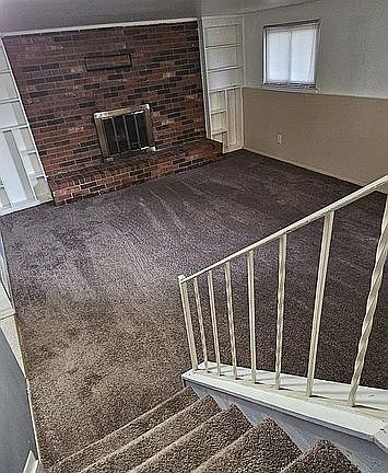 Family room with fireplace.