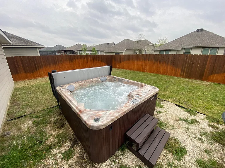 Backyard with hot tub