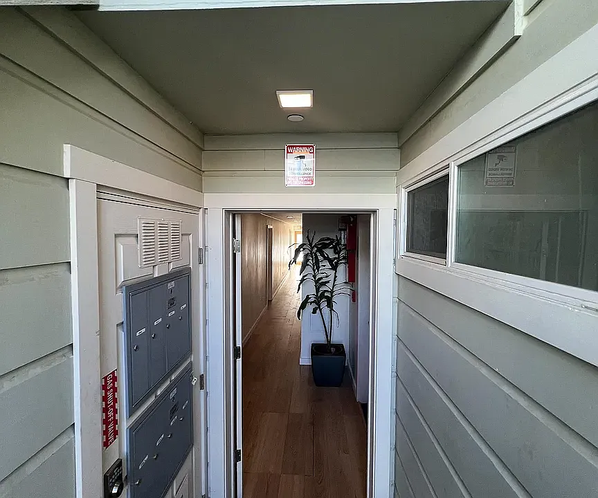 Entrance to hallway (keypad door)