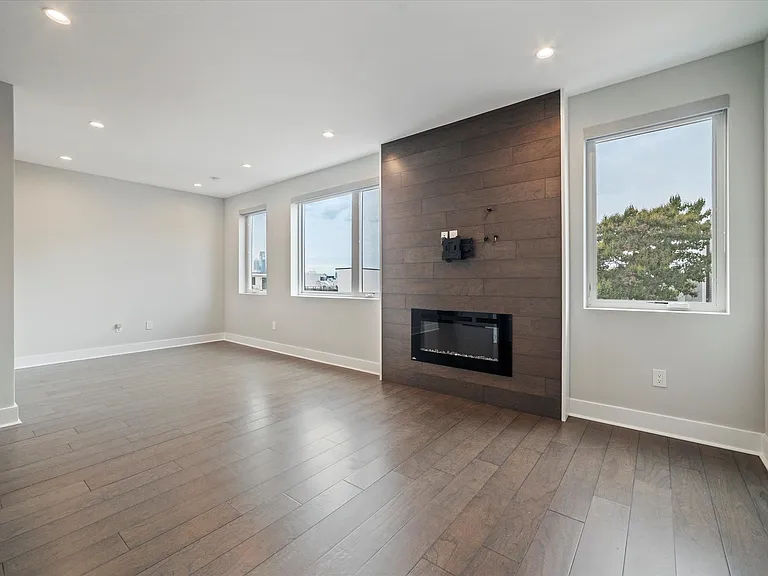 Electric Fireplace & City views from your unit!