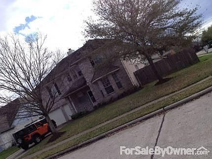 View from street
						:
						Large corner lot, new landscaping in front beds.