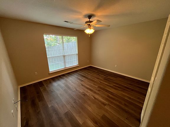 Master bedroom, looking onto the backyard