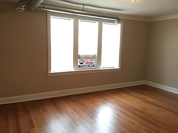 2nd image of 9040 S Langley Ave #1