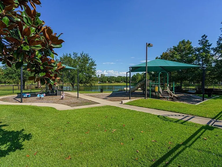 12406 Santiago Cove Ln — Photo 41