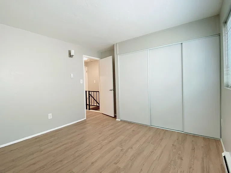 Bedroom 2 - separated by the bathroom and hallway from Bedroom 1. Expansive closets.