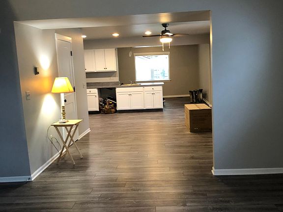 In front room looking back to kitchen and family room/office.