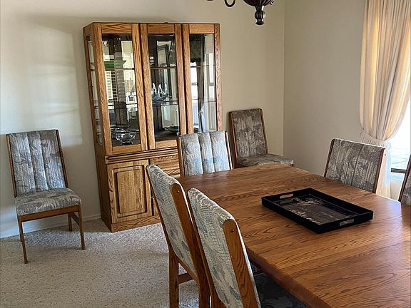 Formal dining room with space to seat 8