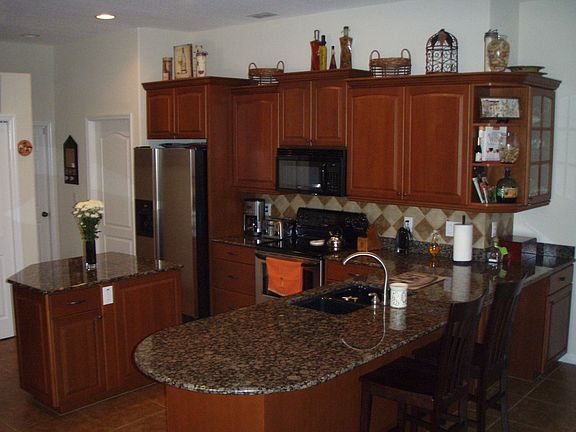 Gourmet Kitchen with Granite Countertops and Stainless Steel Appliances