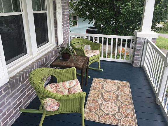 rocking front porch with meadow view