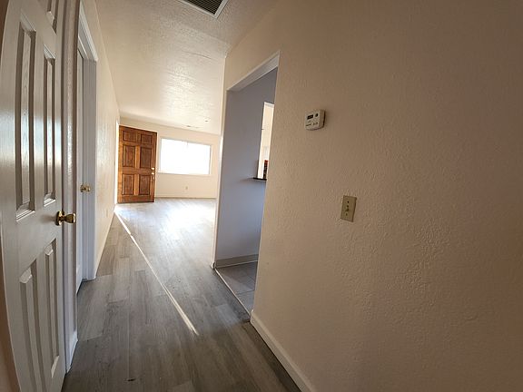 hallway to front door kitchen and livingroom_08162024