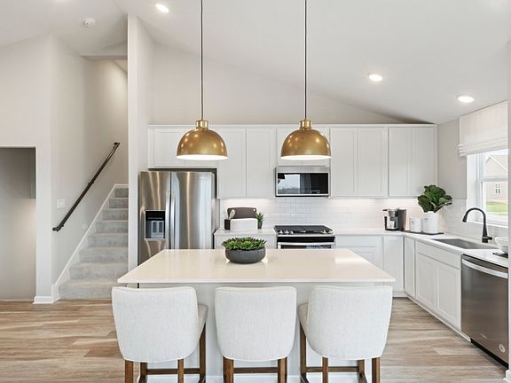 A kitchen designed for cooking, gathering, and living.