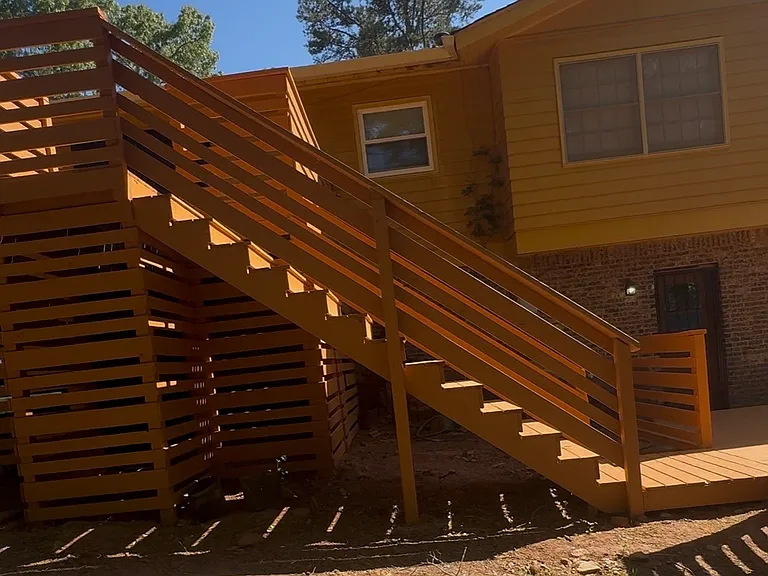 view of deck steps. newly painted