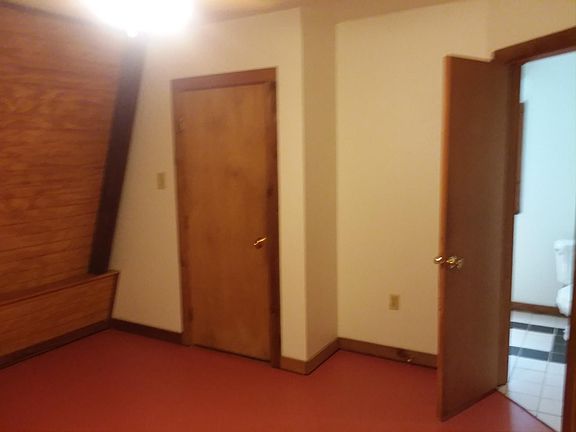 Downstairs bedroom, walk in closet and bathroom.