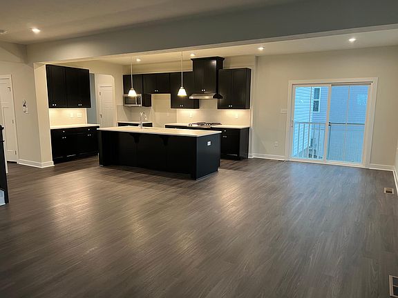 open concept kitchen and the family room