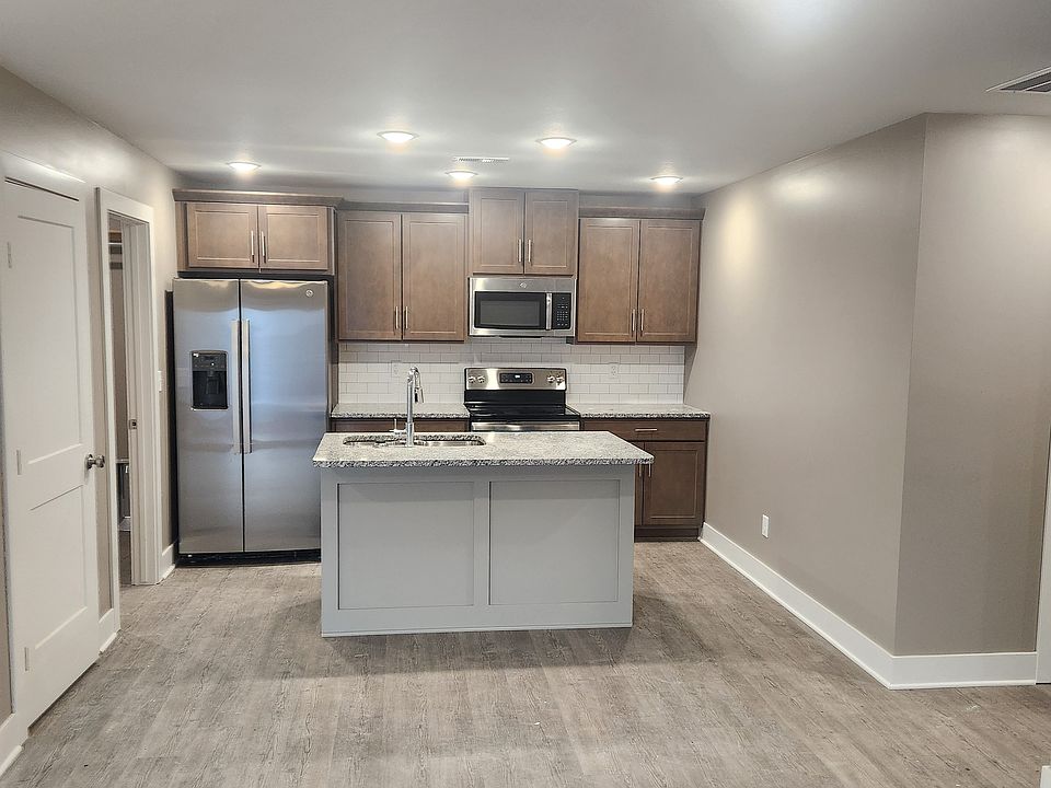 Kitchen with all stainless steel appliances