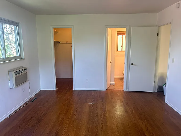 Master bedroom has closet, ensuite bathroom, and room A/C unit (there is central A/C also but you could use this one unit if you don't want to cool the entire house)