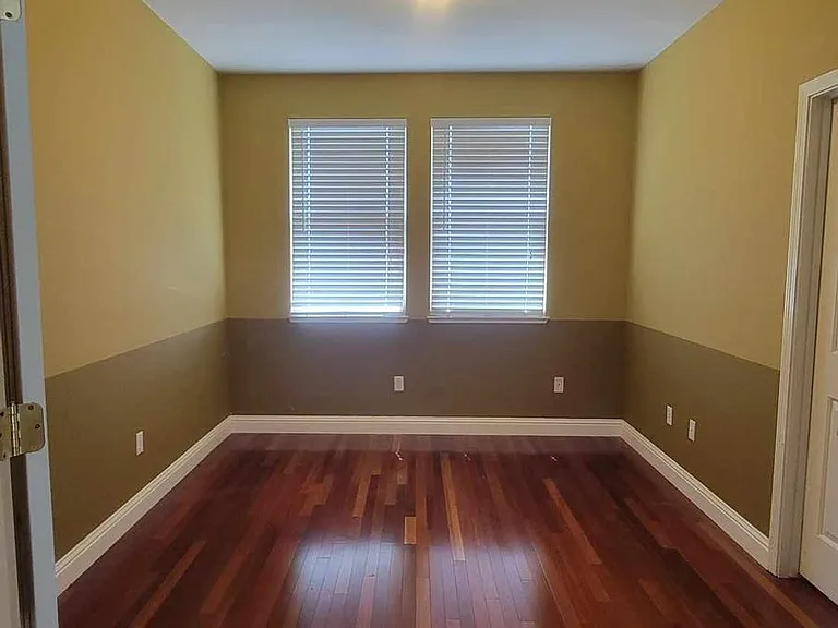 3rd bedroom has double-doors and walk in closet, overlooking side of house (Shana way)