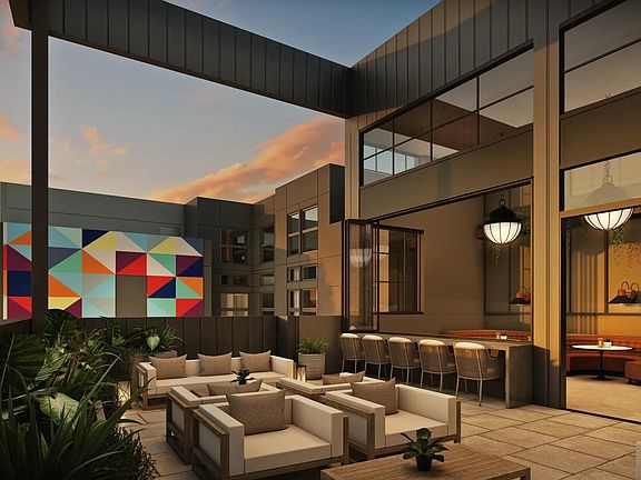 Rooftop deck with indoor/outdoor space showcasing stunning views.